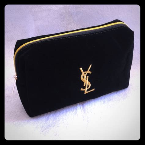 ysl yves saint laurent beauté tangs|YSL gold makeup case.